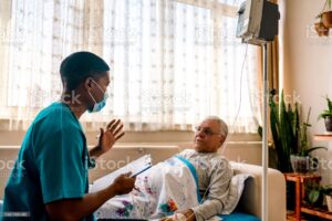 elderly man hospital bed
