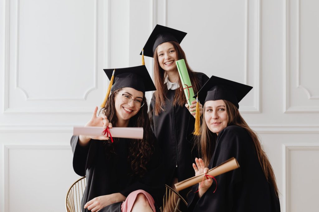 young women in their graduation toga