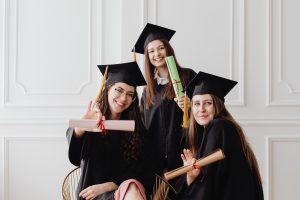 young women in their graduation toga